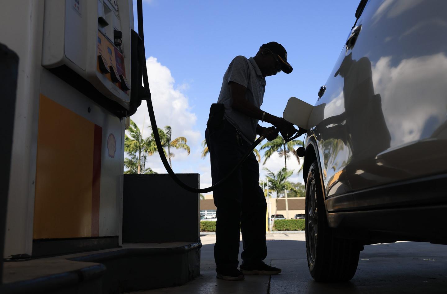 MIAMI, FLORIDA - OCTOBER 24: A customer pumps gas into their vehicle on October 24, 2025 in Miami, Florida. According to the new Bureau of Labor Statistics data released on October 24, the 12-month inflation rate climbed to 3 percent in September, up from 2.9 percent in August, as gasoline prices rose by 4.1 percent, a major driver of inflation last month. (Photo by Joe Raedle/Getty Images)