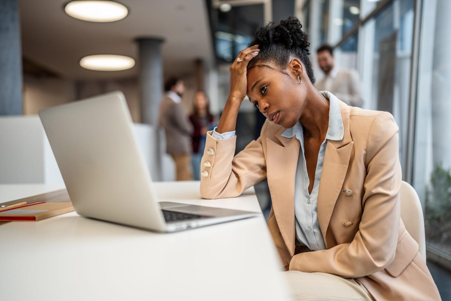Isolated Gen Z worker in office