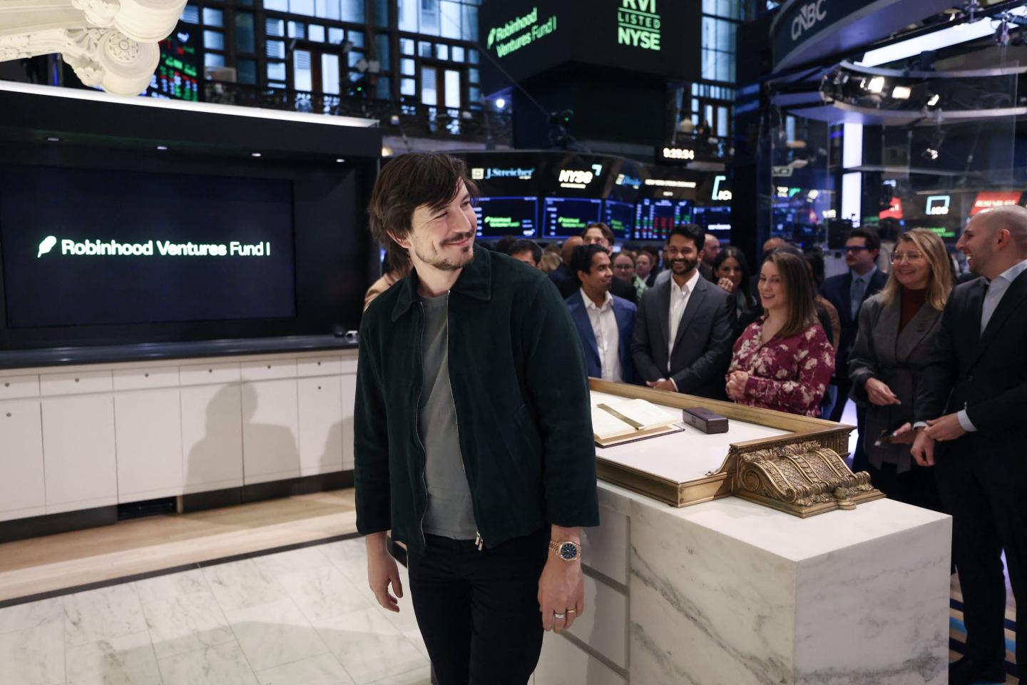 Robinhood CEO Vladimir Tenev smiles during the ringing of the Opening Bell at the New York Stock Exchange last March.