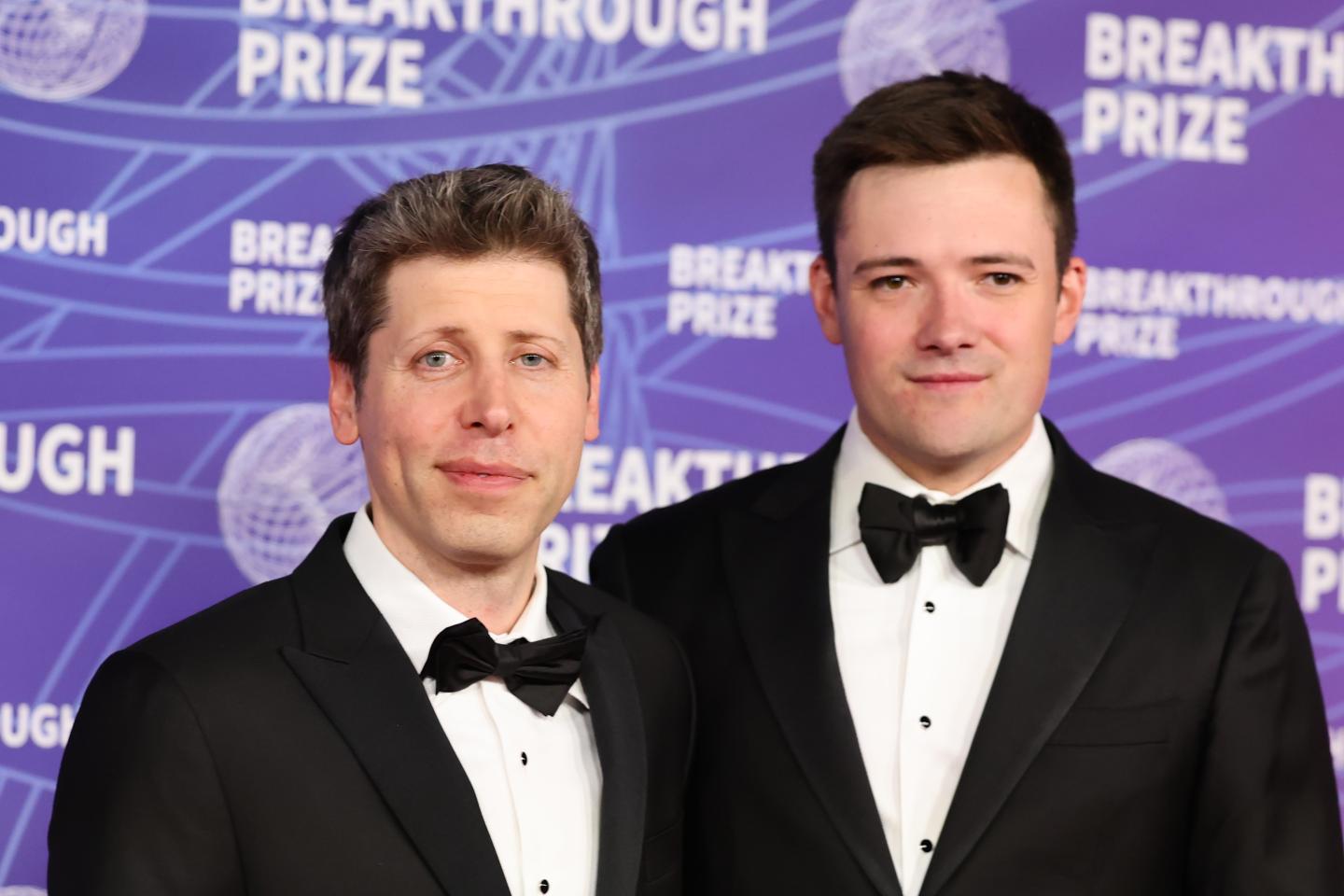Sam Altman and Oliver Mulherin pose