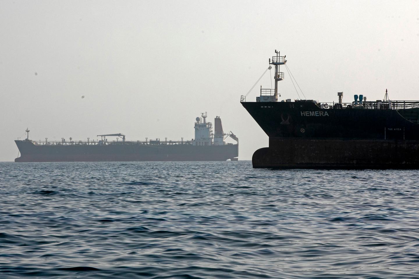 A ship remains anchored on May 16, 2026 in the Strait of Hormuz near Larak Island, Iran.