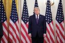 US President Donald Trump looks on during a swearing in ceremony for new Chairman of the Federal Reserve Kevin Warsh in the East Room of the White House in Washington, DC on May 22, 2026.