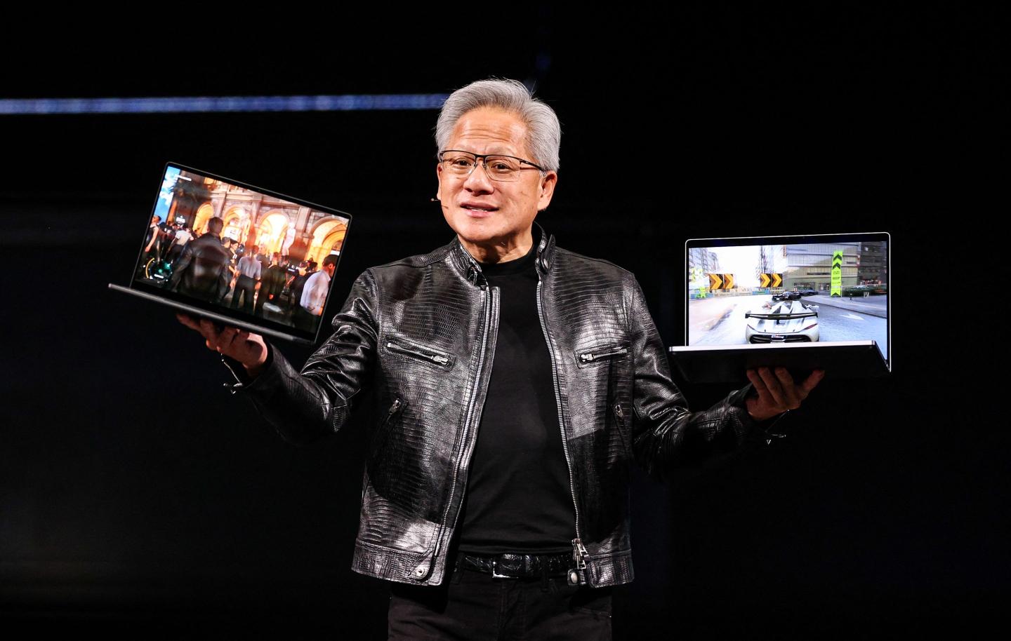 Nvidia CEO Jensen Huang introduces the RTX Spark laptop during his keynote speech at Computex 2026 in Taipei on June 1, 2026.