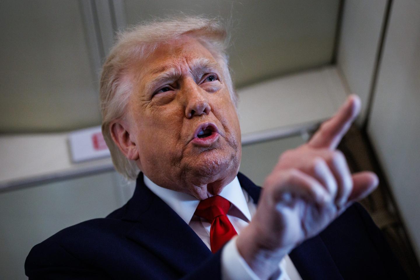 U.S. President Donald Trump speaks with reporters while aboard Air Force One en route to Chippewa Falls, Wisconsin on June 5, 2026.