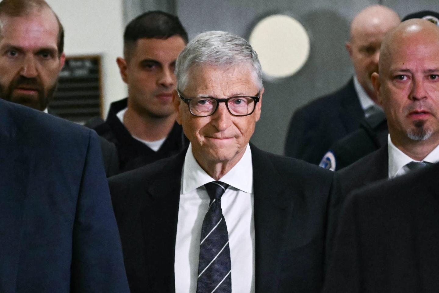 Microsoft co-founder Bill Gates (C) arrives for a closed-door interview with the House Oversight Committee on Capitol Hill in Washington, DC, on June 10, 2026.