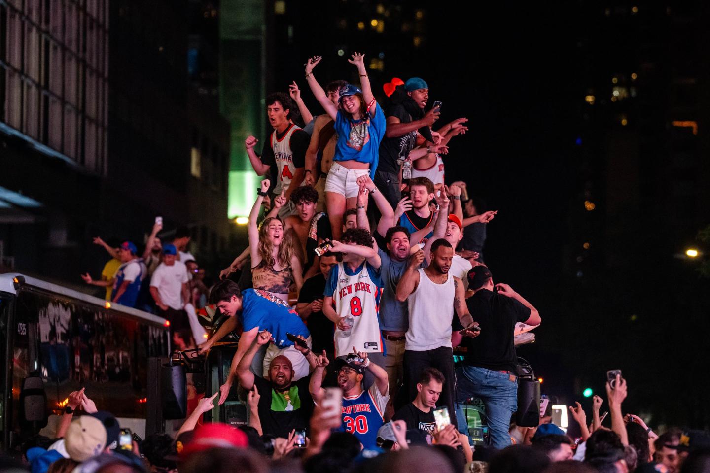 Knicks fans celebrate in the city after the victory