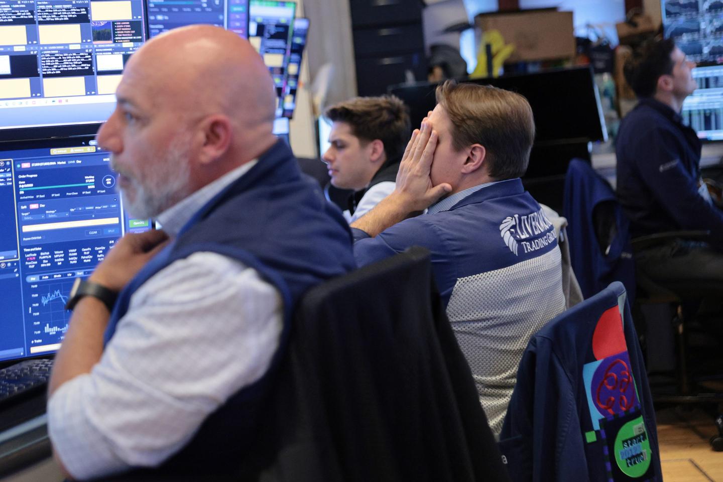 Traders work on the floor of the New York Stock Exchange during afternoon trading on June 10, 2026 in New York City.