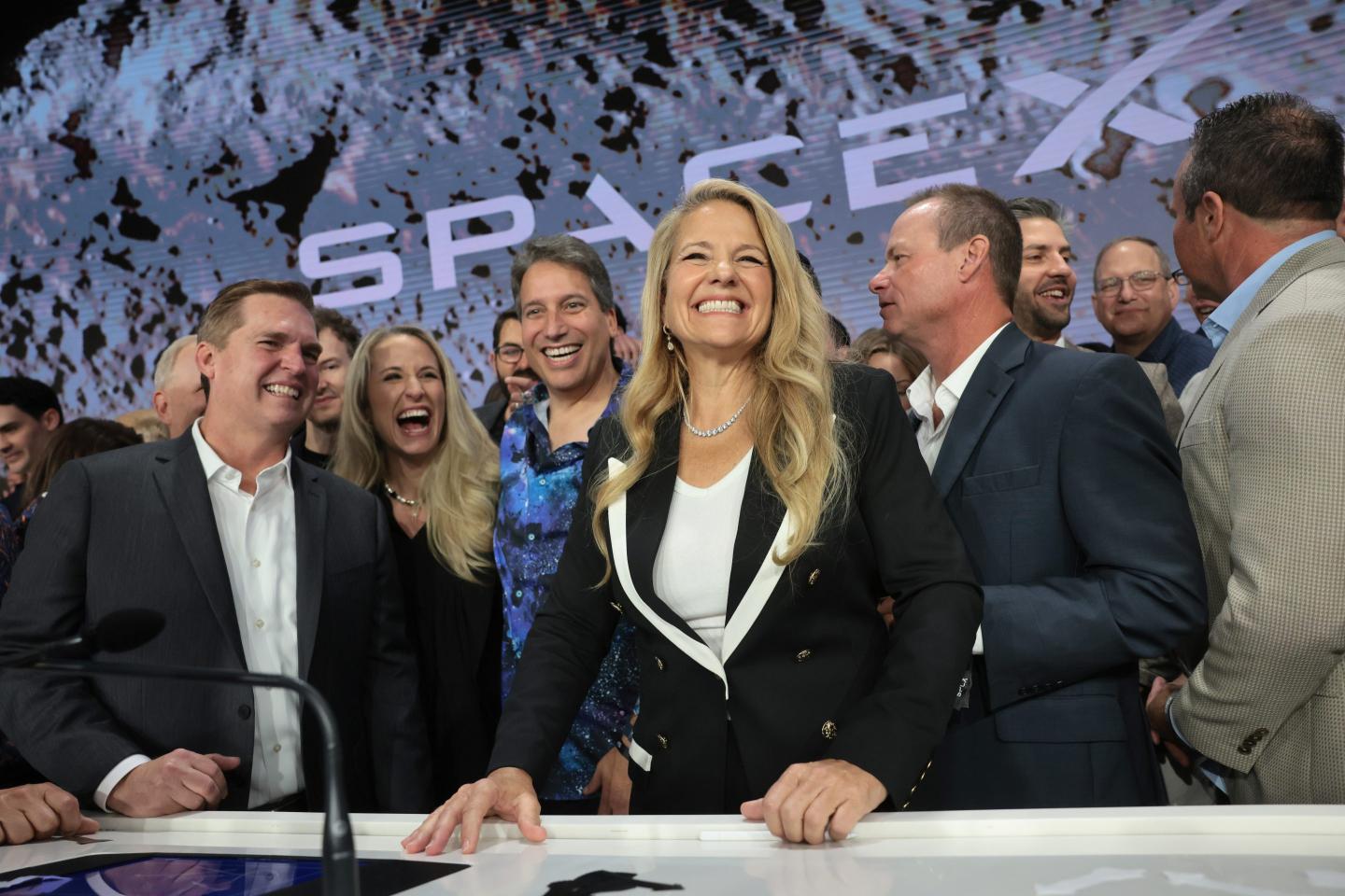 Shotwell stands and smiles widely