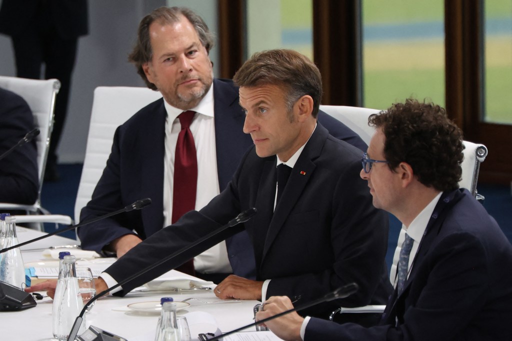 France's President Emmanuel Macron (center) with Salesforce CEO Marc Benioff (left) and Anthropic CEO Dario Amodei (right) at a working lunch meeting at the G7 summit in Evian, France, on June 17, 2026.(Photo: Ludovic Marin/AFP/Getty Images)