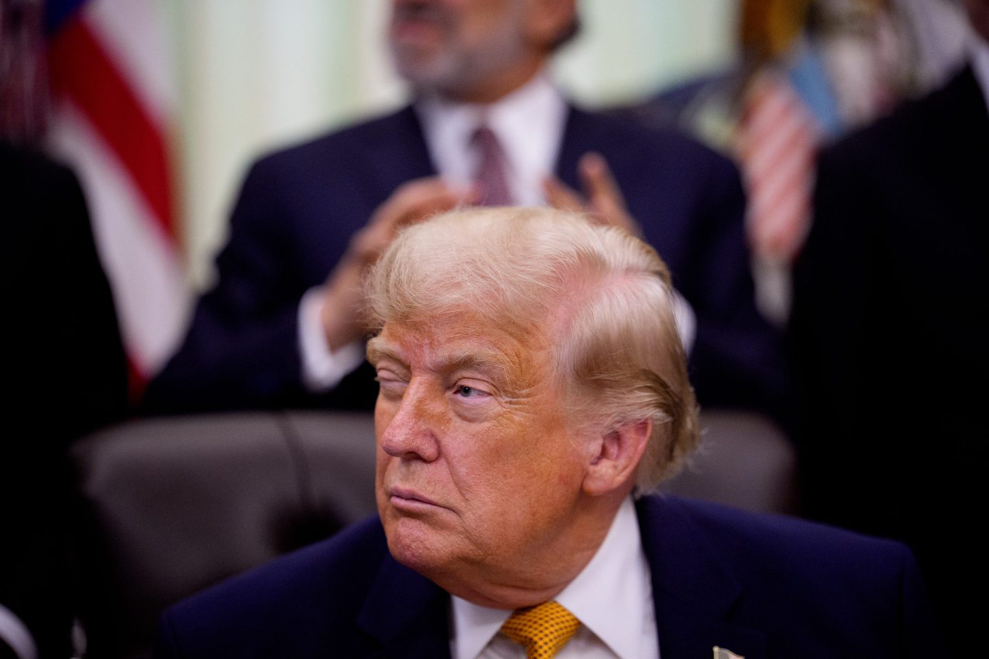 U.S. President Donald Trump winks during an executive order signing event in the Oval Office of the White House on June 22, 2026 in Washington, DC.