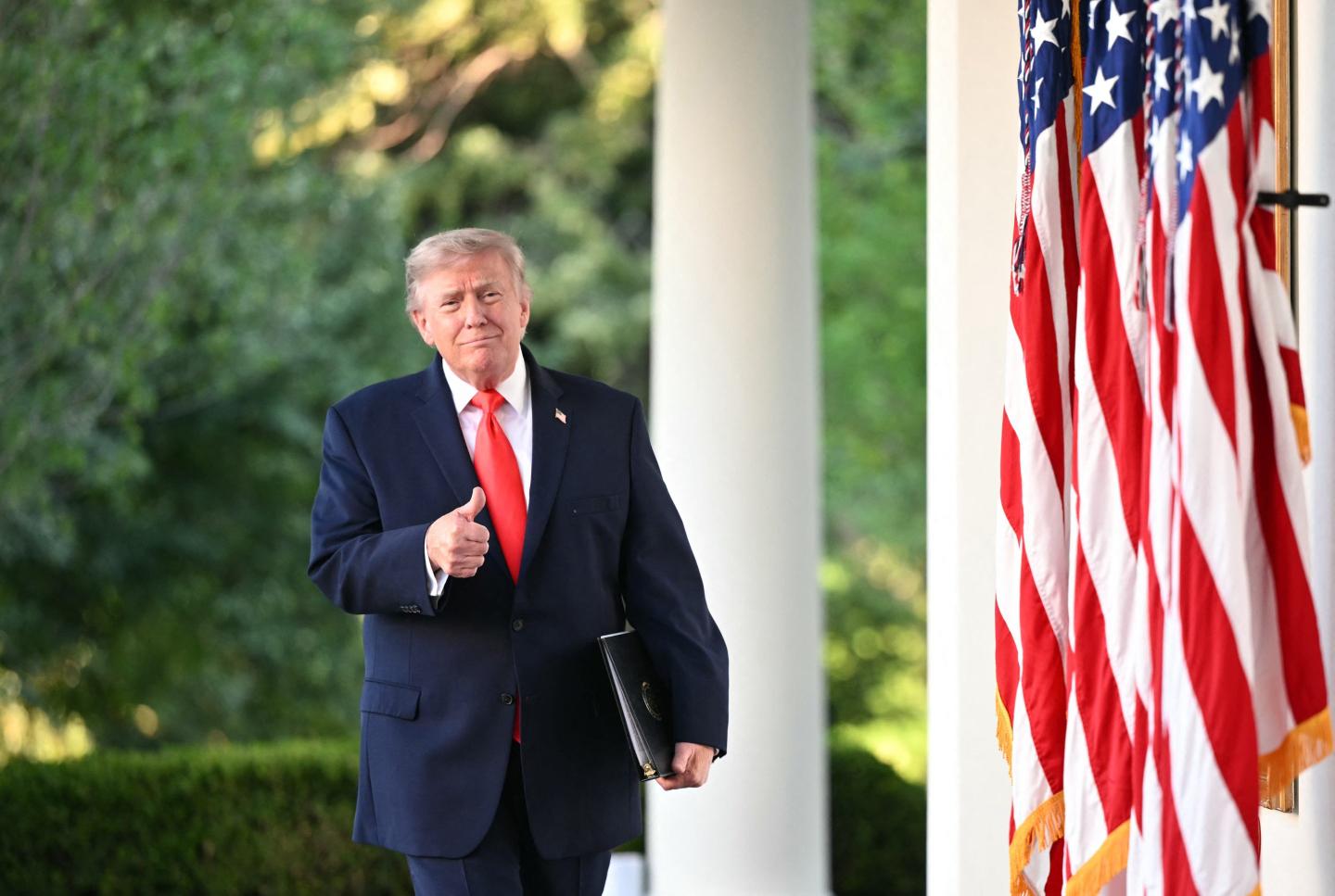 US President Donald Trump arrives to speak during a Rose Garden Club dinner with American farmers at the White House in Washington, DC, on June 25, 2026.