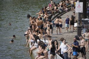 How Paris is using the Seine to try to keep cool in scorching heat