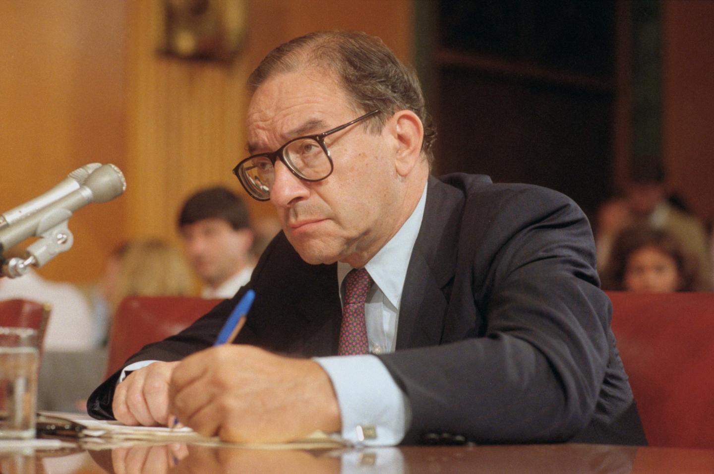 Alan Greenspan testifying before the Senate Banking Committee.