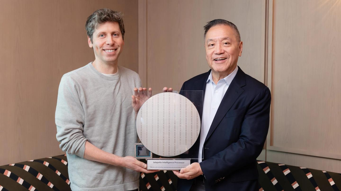 OpenAI CEO Sam Altman (left) and Broadcom CEO Hock Tan holding their new AI chip, “Jalapeño.” (Photo courtesy OpenAI)