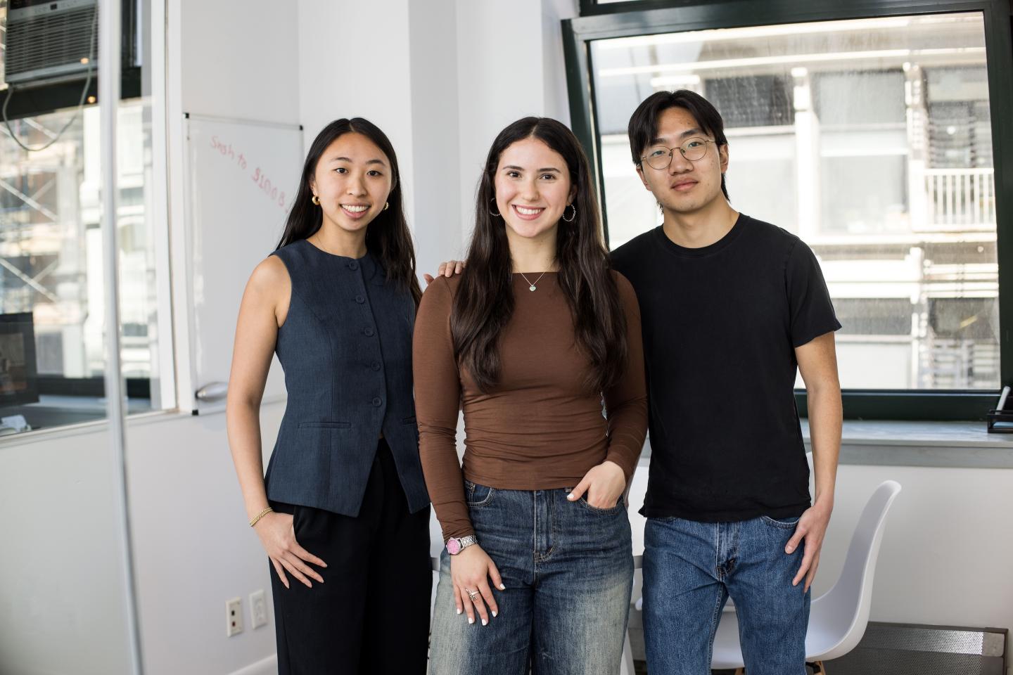 Alexandra Debrow flocked by her cofounders