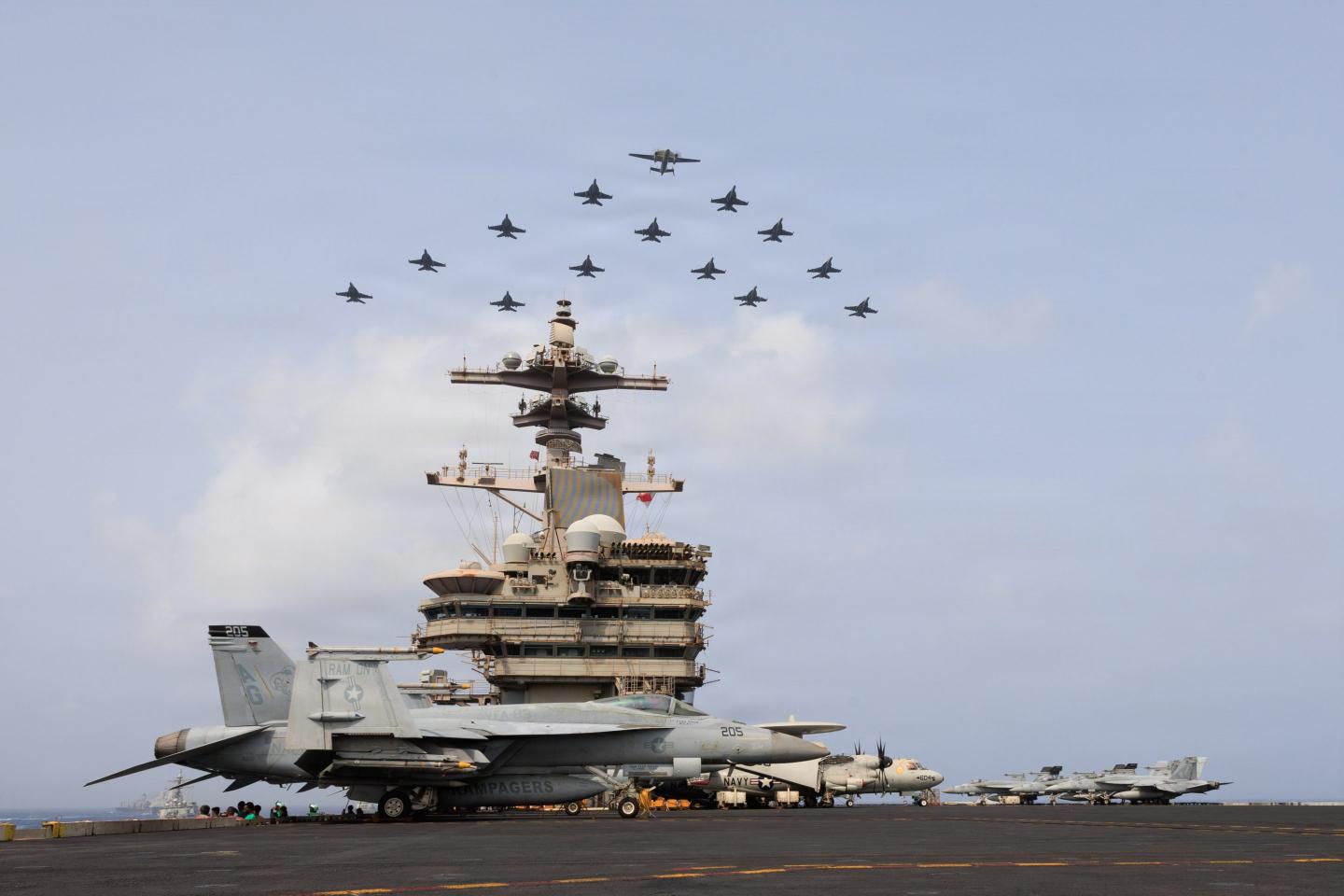 U.S. Navy aircraft and warships transit the Arabian Sea in close formation as CENTCOM forces continue to promote regional security and stability, June 30, 2026. 