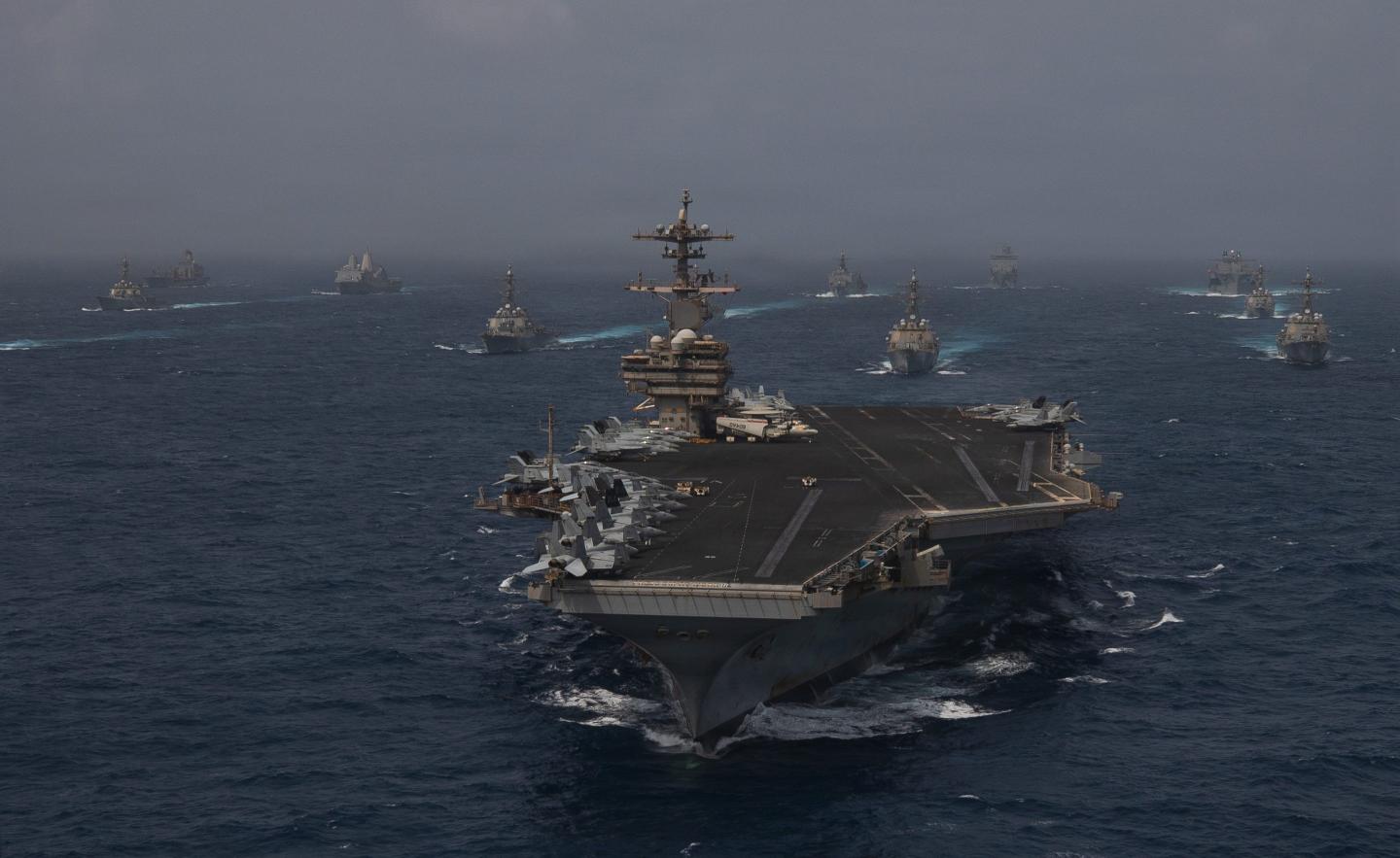 U.S. Navy warships transit the Arabian Sea in close formation on June 30, 2026.
