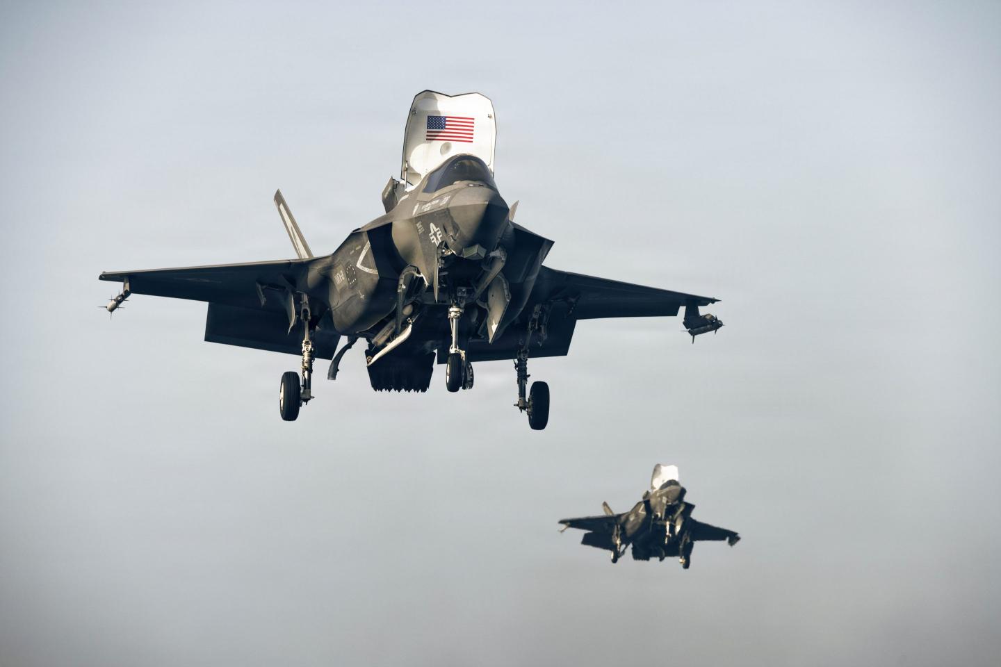 U.S. Marine Corps F-35B Lightning IIs assigned to Marine Fighter Attack Squadron (VMFA) 121, 31st Marine Expeditionary Unit, land aboard forward-deployed America class assault ship USS Tripoli (LHA 7), during flight operations in the U.S. Central Command area of responsibility, June 9, 2026.