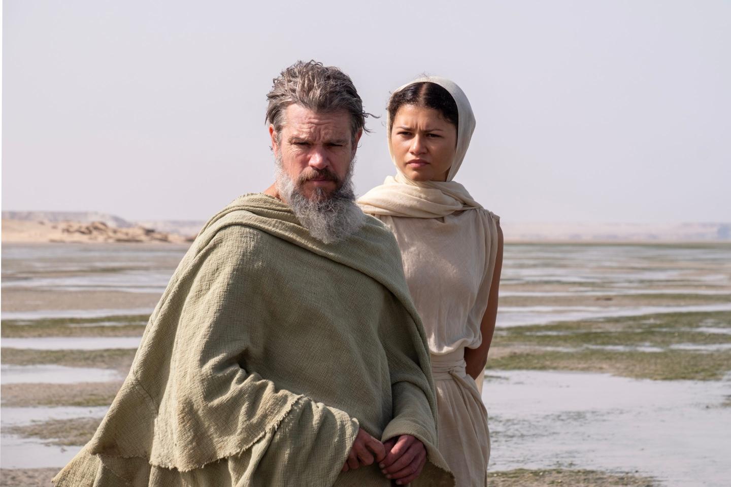 Matt Damon as Odysseus, left, and Zendaya as Athena, in a scene from "The Odyssey."