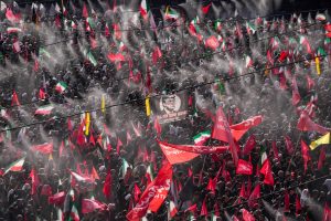 Iranians demand revenge at funeral ceremonies for supreme leader killed during war, while his replacement has yet to appear to mourn his father