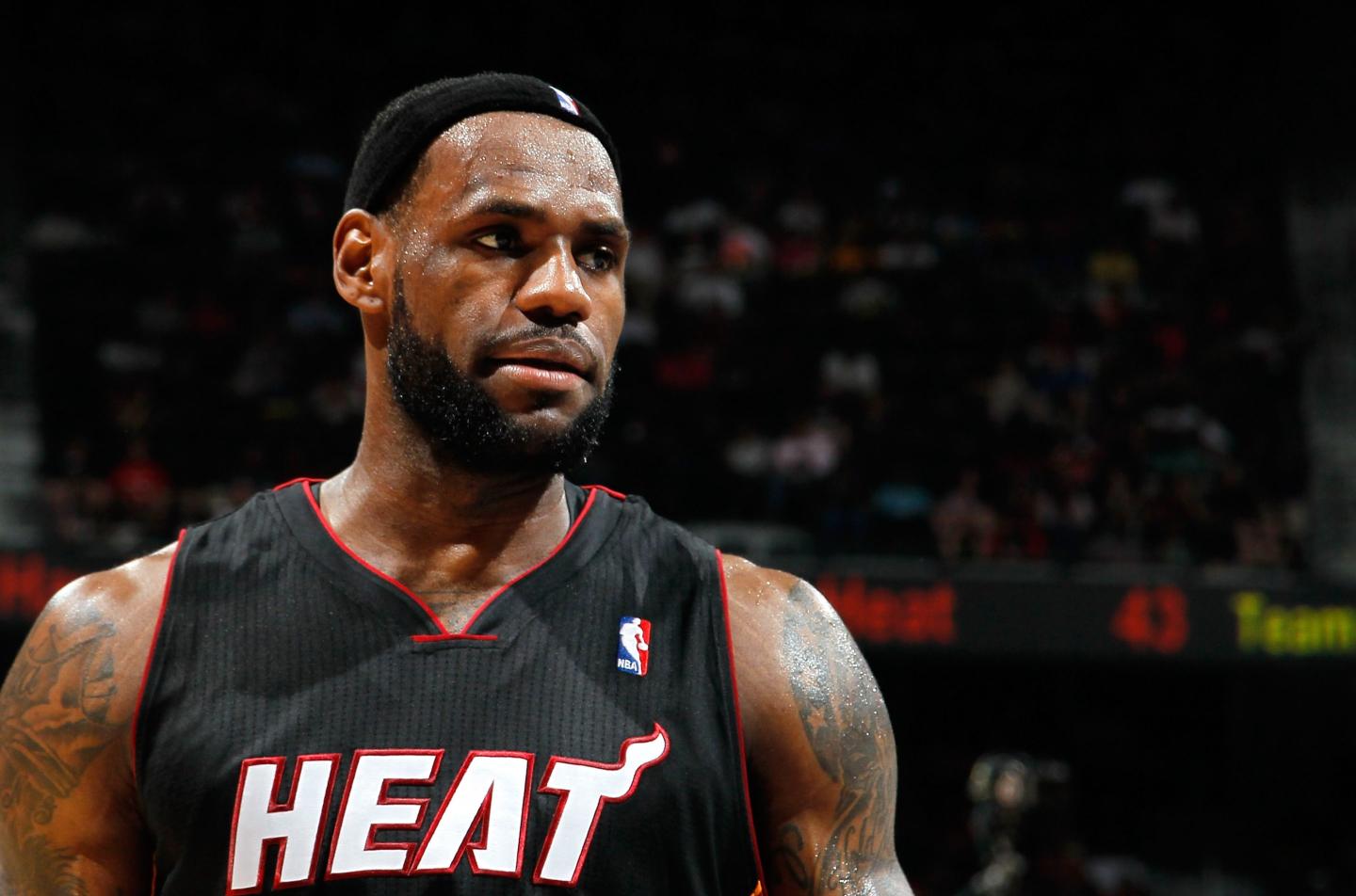 LeBron James wearing Miami Heat jersey.
