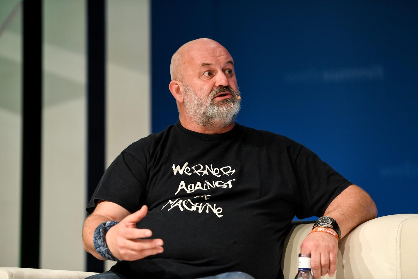 Amazon CTO Werner Vogels speaking on stage.