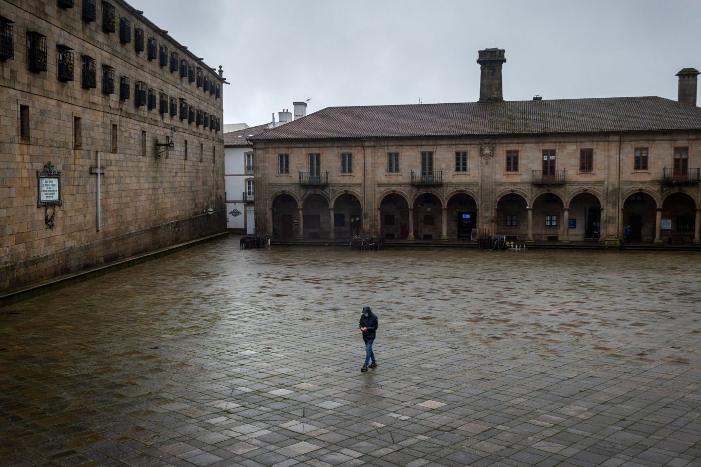 Covid public plaza one person walking