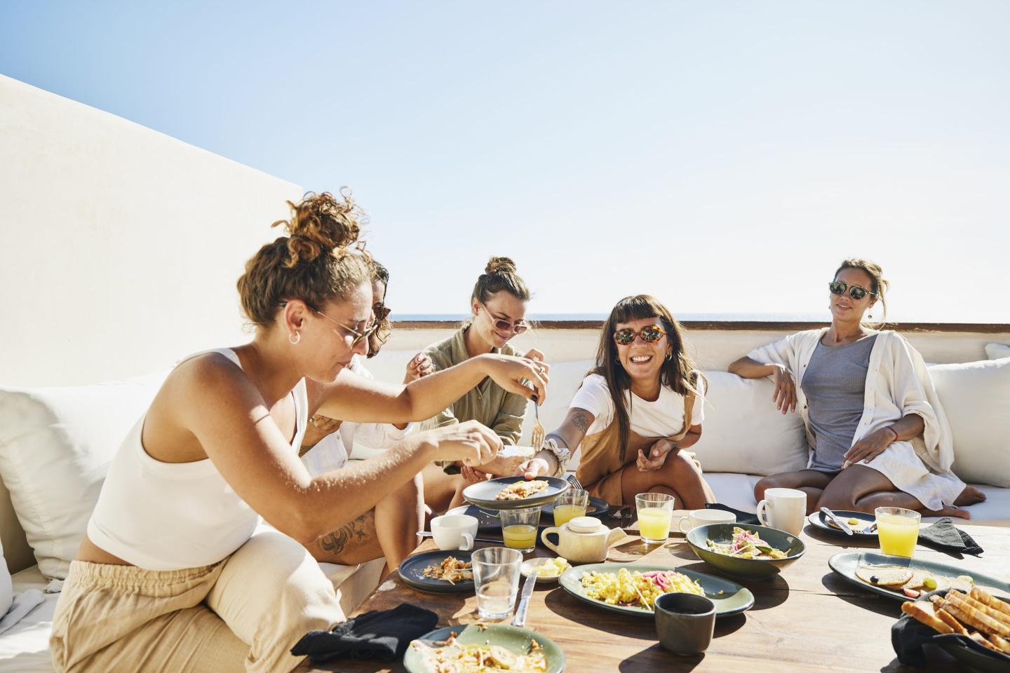 A group of smiling female friends.