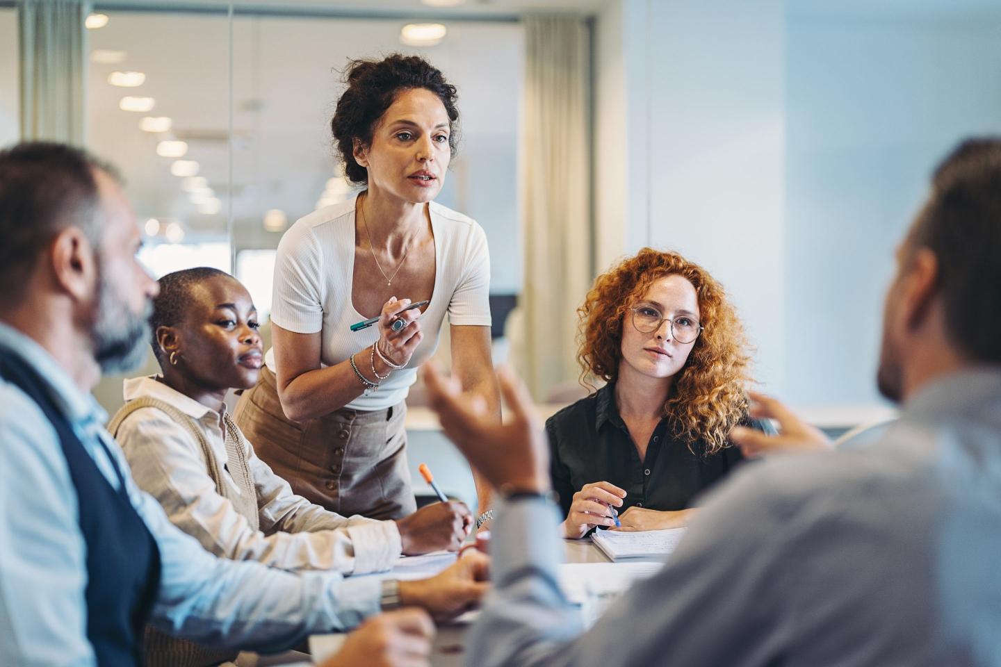 Middle aged businesswoman talking during a meeting