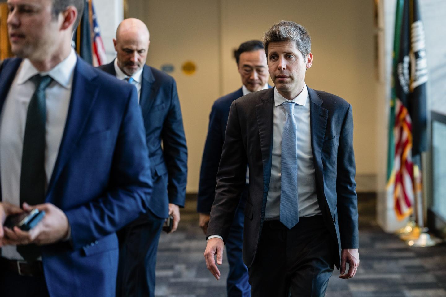 Sam Altman walking