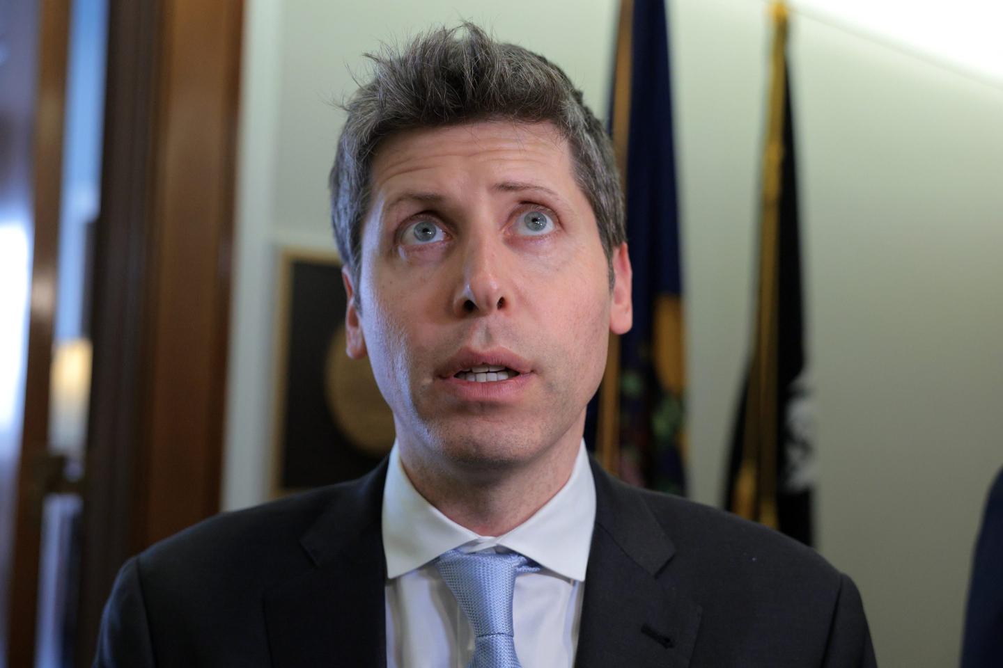 OpenAI CEO Sam Altman looking up.