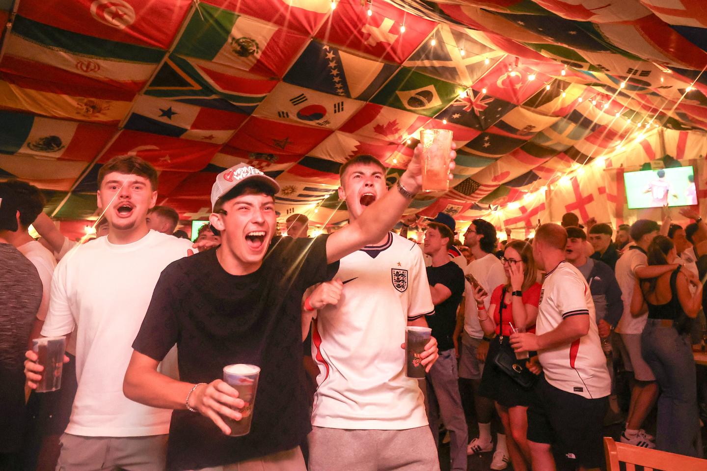 Photo: World Cup fans drinking.