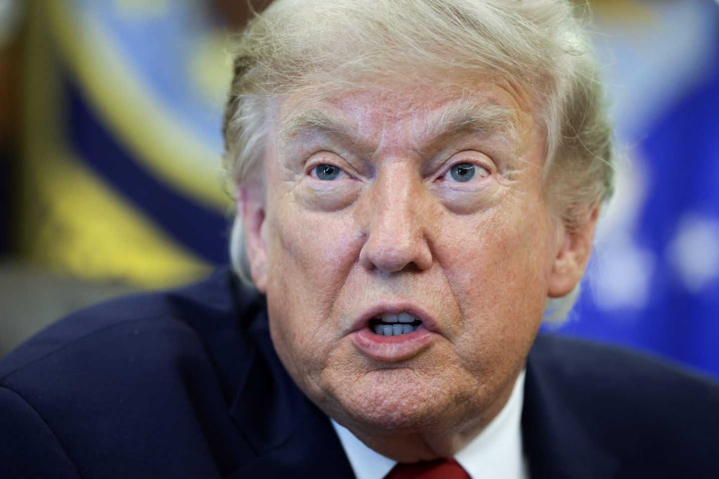 U.S. President Donald Trump talks to reporters after signing an executive order dealing with automobile repairs with Environmental Protection Agency Administrator Lee Zeldin in the Oval Office at the White House on June 29, 2026 in Washington, DC.