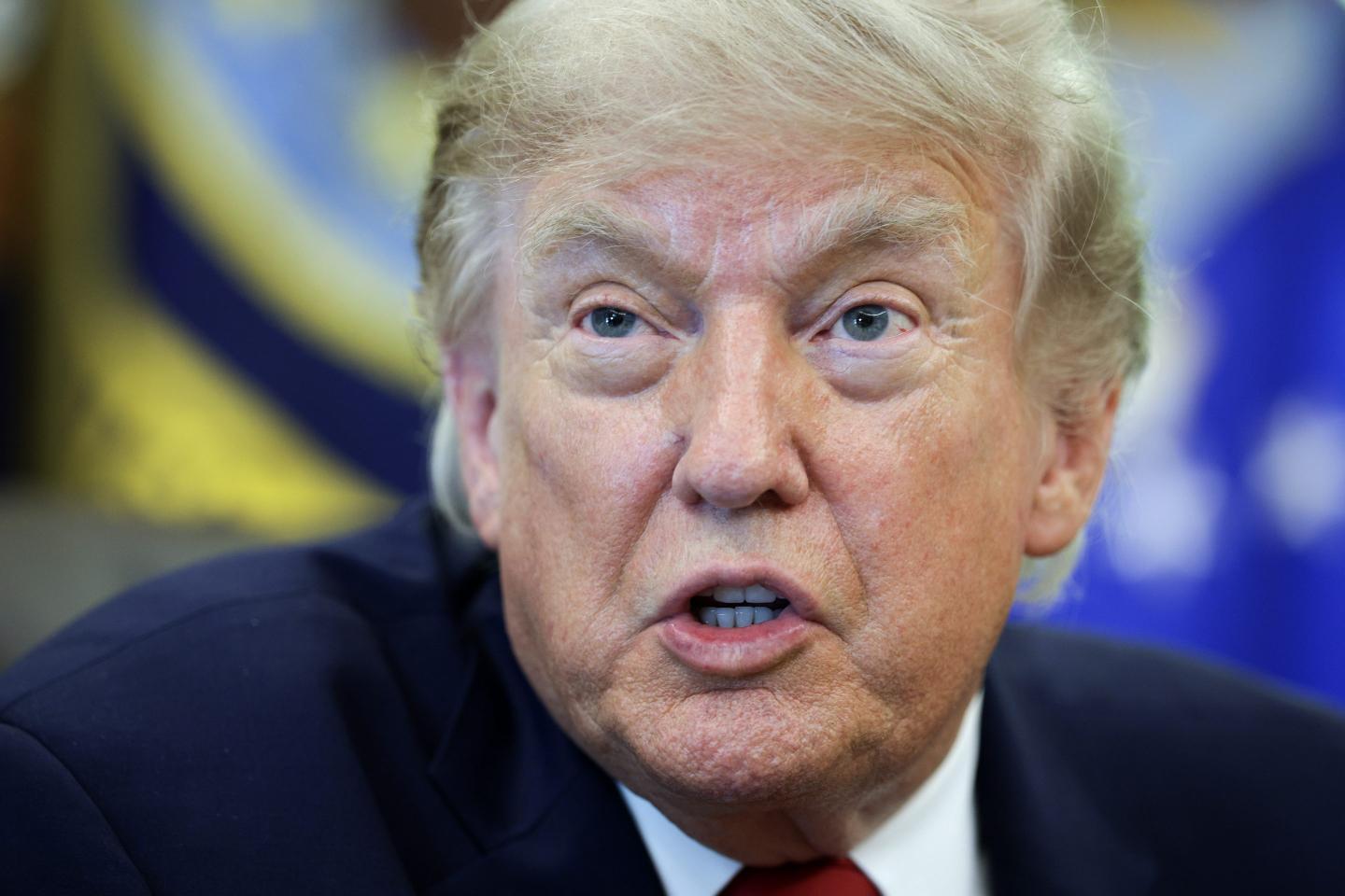 U.S. President Donald Trump talks to reporters after signing an executive order dealing with automobile repairs with Environmental Protection Agency Administrator Lee Zeldin in the Oval Office at the White House on June 29, 2026 in Washington, DC.
