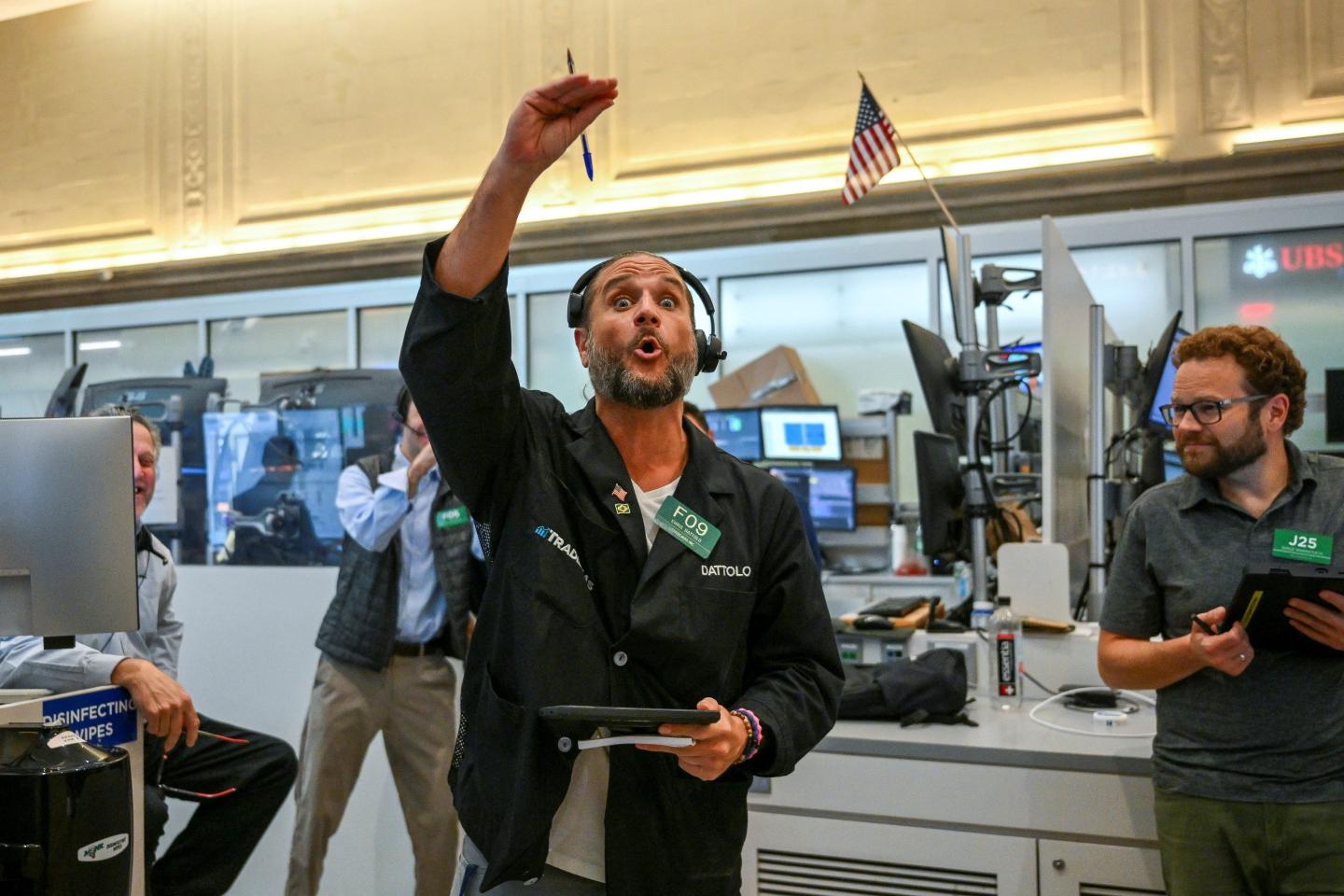 Traders work on the floor of the New York Stock Exchange (NYSE) on July 24, 2026 in New York.