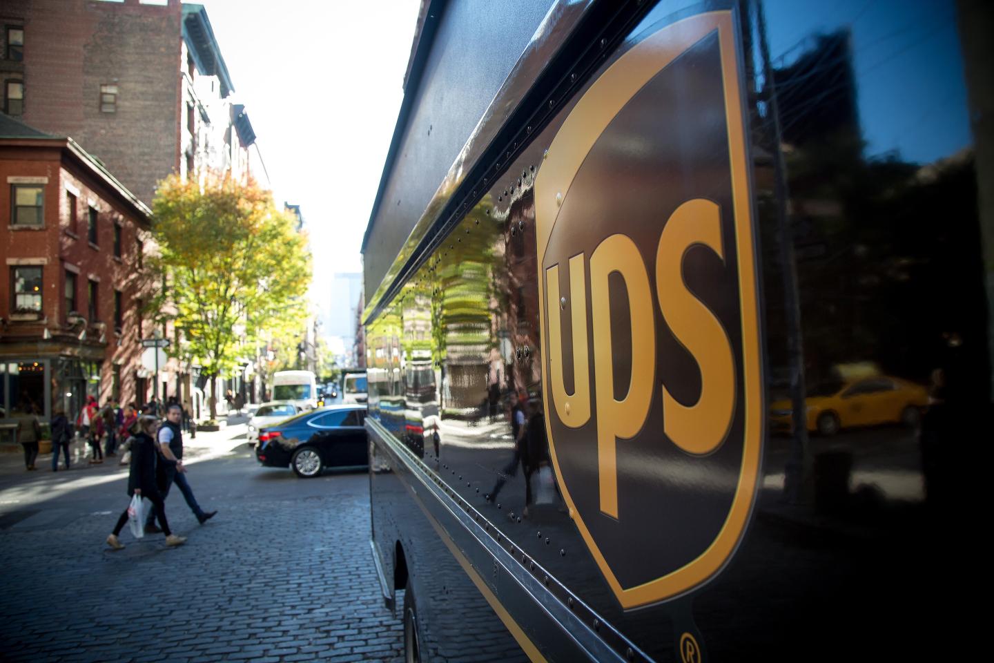 A United Parcel Service Inc. logo is displayed on a truck.