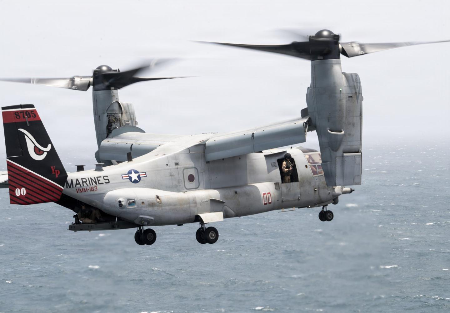 A U.S. Marine Corps MV-22B Osprey, assigned to Marine Medium Tiltrotor Squadron (VMM) 163 (Reinforced), 11th Marine Expeditionary Unit, prepares to land onto the flight deck of Wasp-class amphibious assault ship USS Boxer (LHD 4) during flight operations, July 11, 2026.