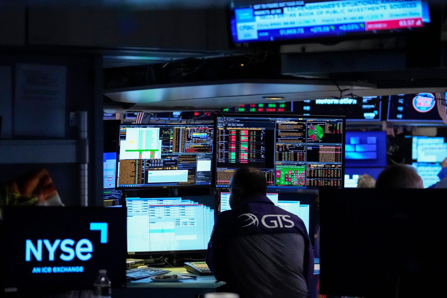 Specialist Dilip Patel works on the floor of the New York Stock Exchange.
