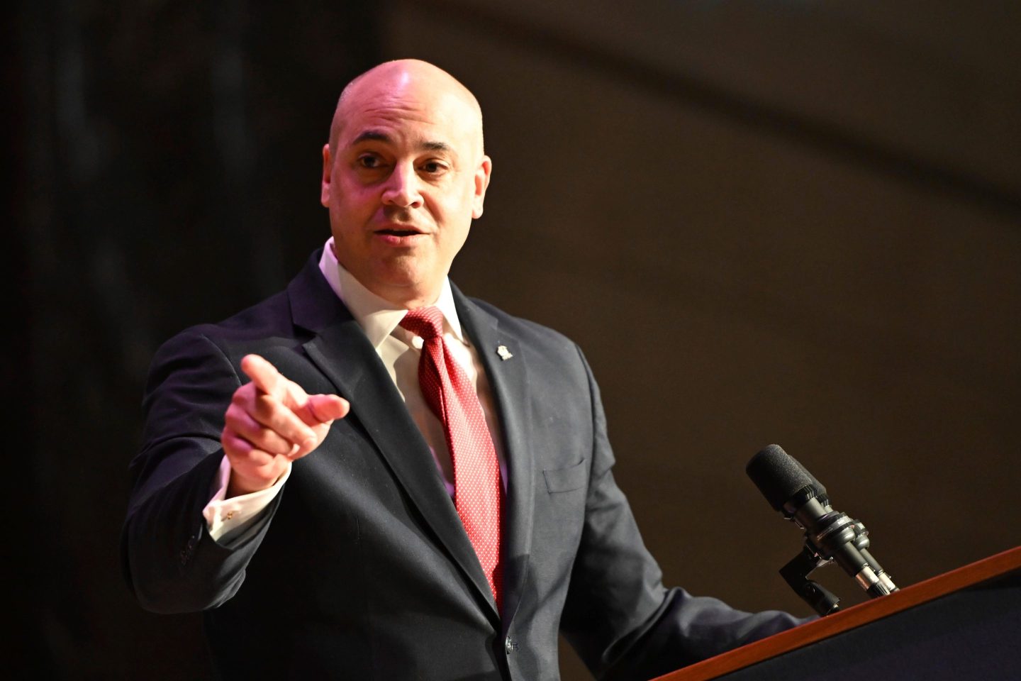 Dave Sunday gestures while speaking to the audience in the Forum Auditorium across the street from the Capitol after taking the oath of office to become Pennsylvania's next attorney general.