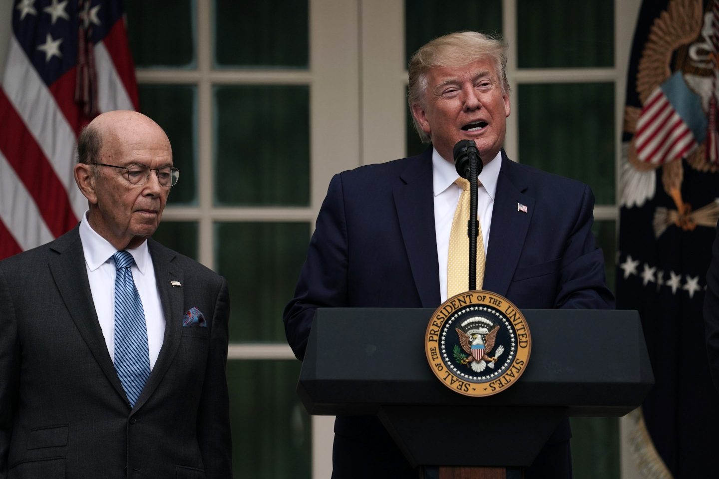 President Donald Trump makes a statement on the census with former Secretary of Commerce Wilbur Ross in the Rose Garden of the White House on July 11, 2019 in Washington, DC.