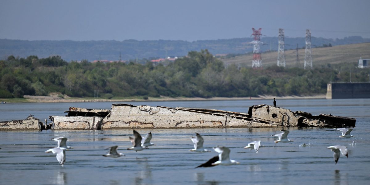 Danube River’s shrinking water levels expose dozens of World War II ships