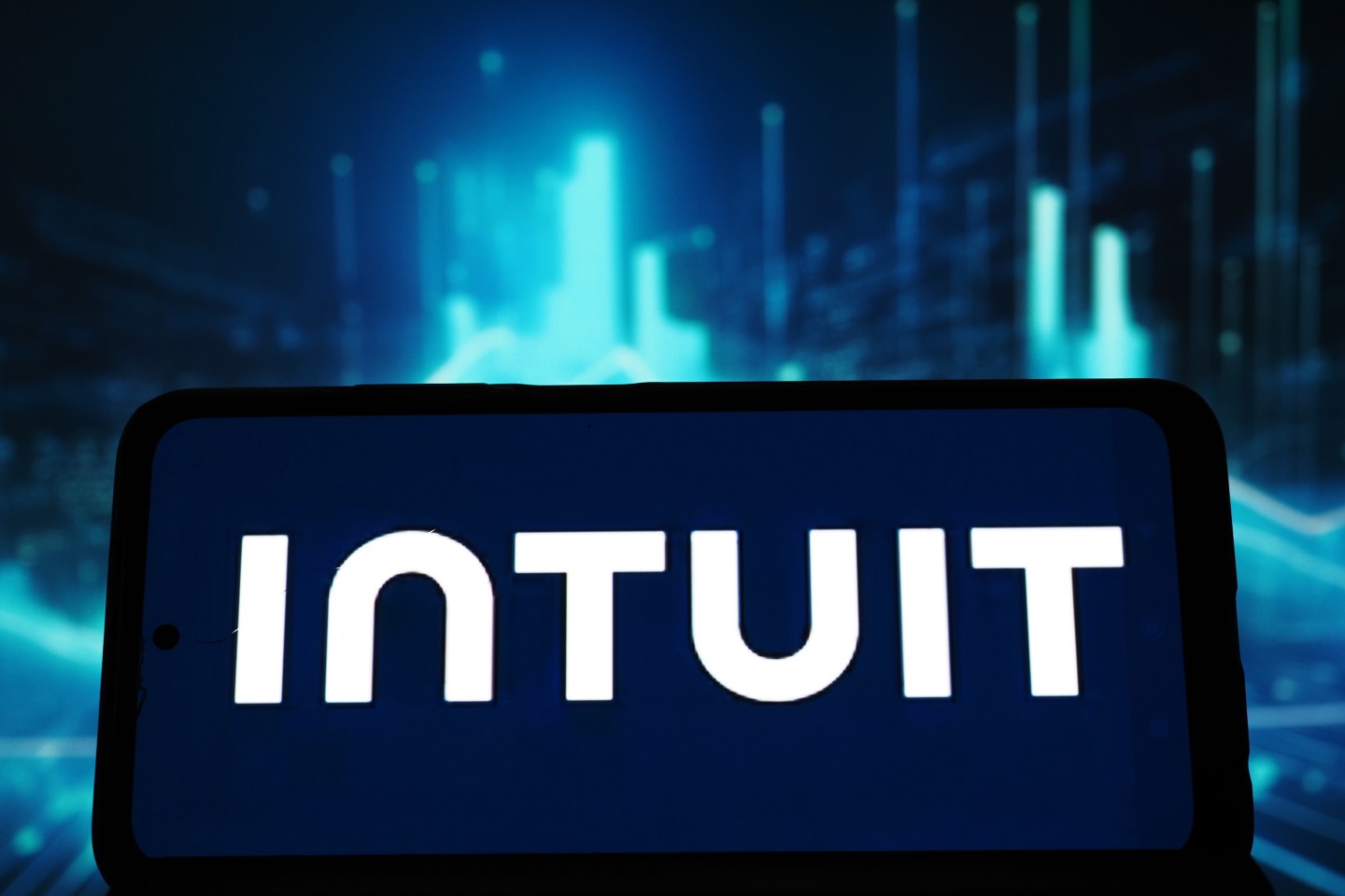In this photo illustration, an Intuit Inc. logo seen displayed on a smartphone.