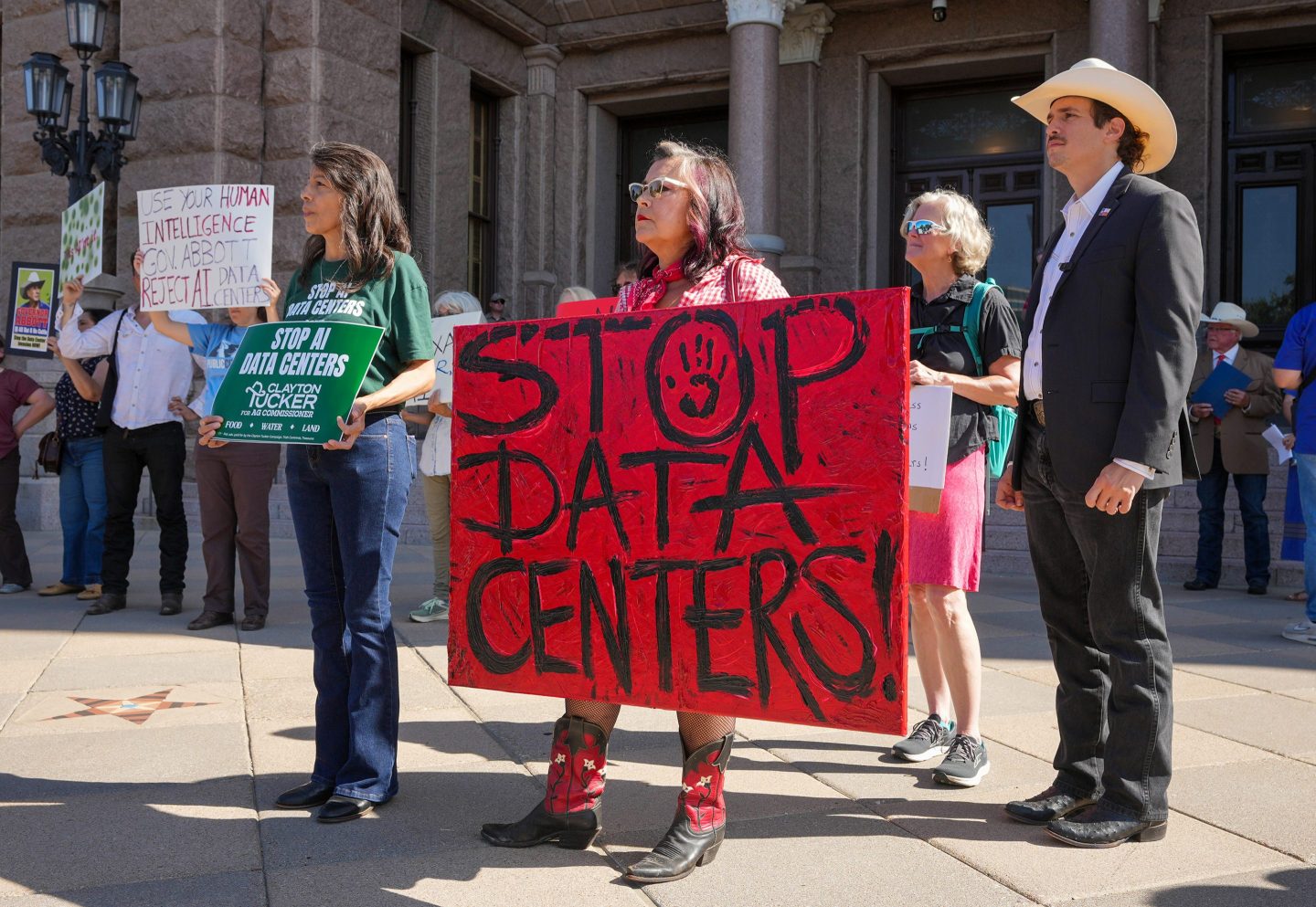 Photo of people protesting data centers in Texas
