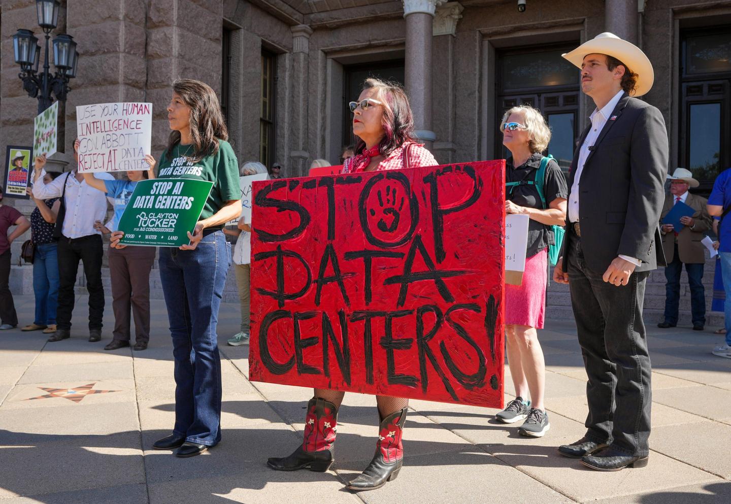 Photo of people protesting data centers in Texas