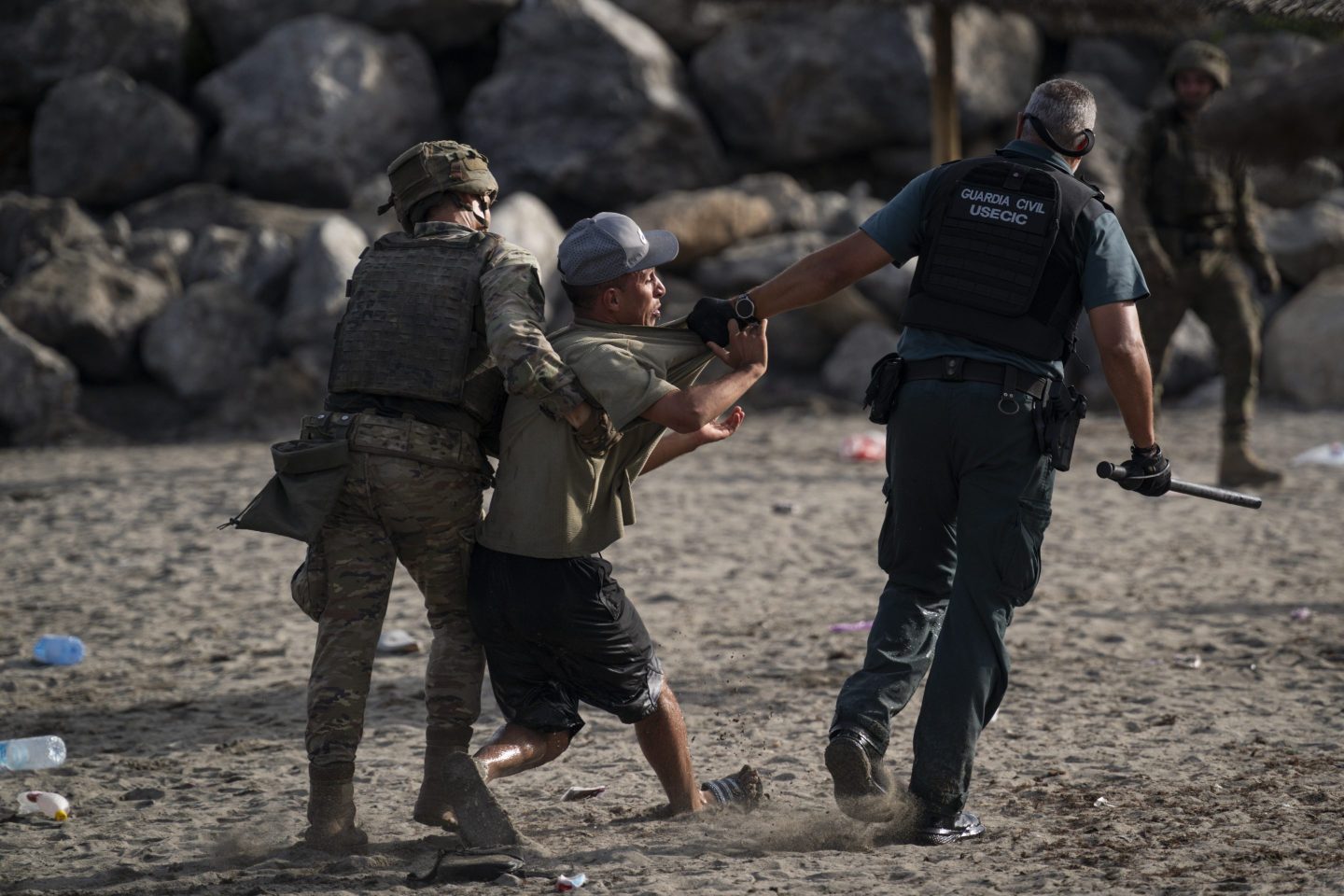 Spain puts up a 1,600-foot sea barrier between Ceuta and Morocco after EU states warn against ‘uncontrolled mass crossings’