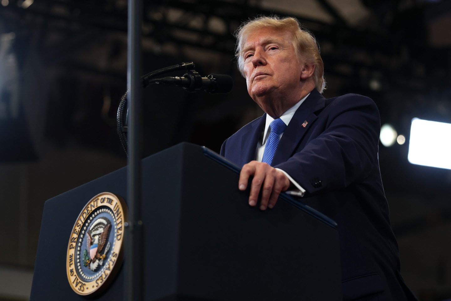 U.S. President Donald Trump pauses while delivering remarks at the David S. Mack Center for Training and Intelligence.