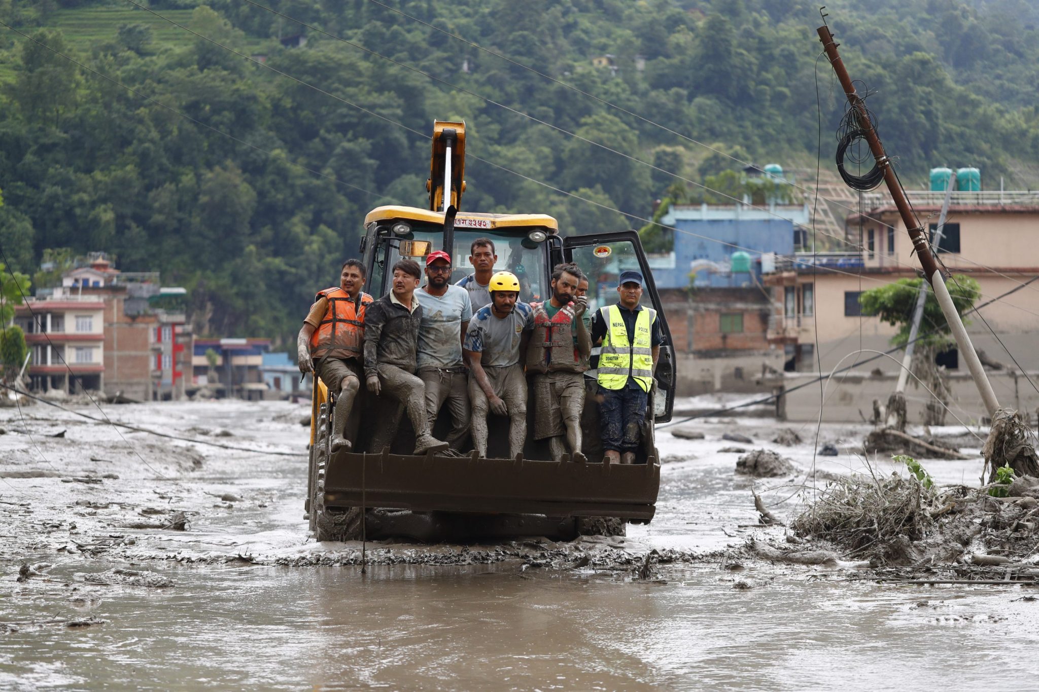 At least 360 people are dead and 1,400 missing after catastrophic floods sweep communities on the Nepal-China border