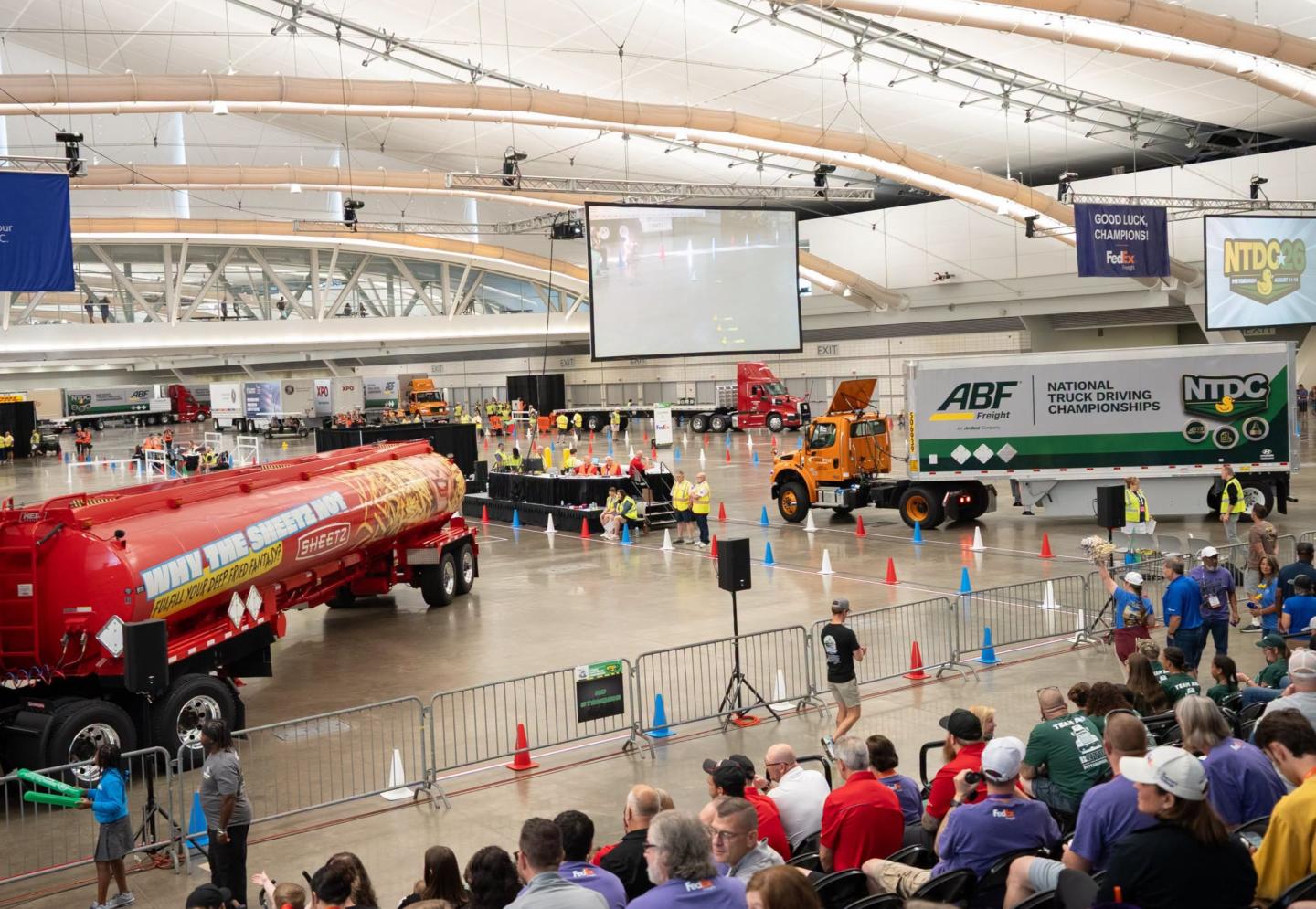 Trucks navigate the obstacle course at the National Truck Driving Championships