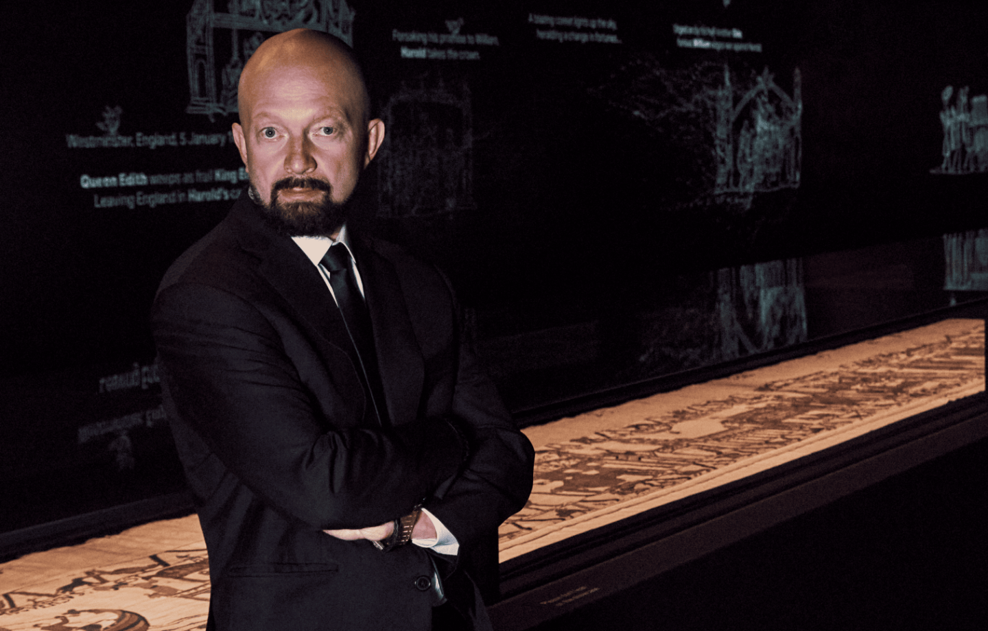 Igor Tulchinsky stands in front of the Bayeux Tapestry exhibition in London. It is the first time the tapestry has been seen in the U.K.