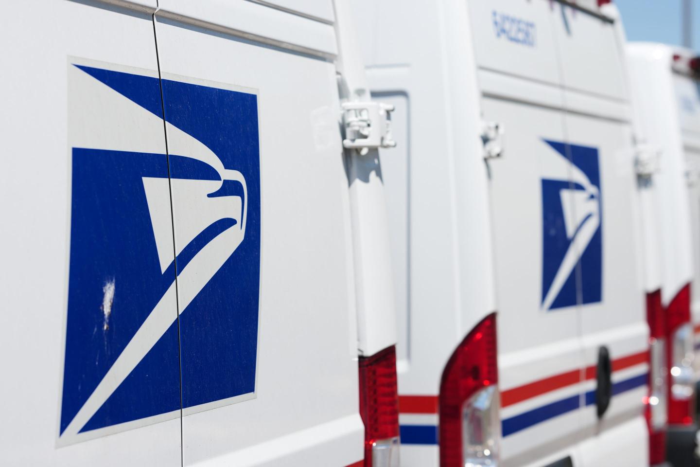 Photo of USPS trucks